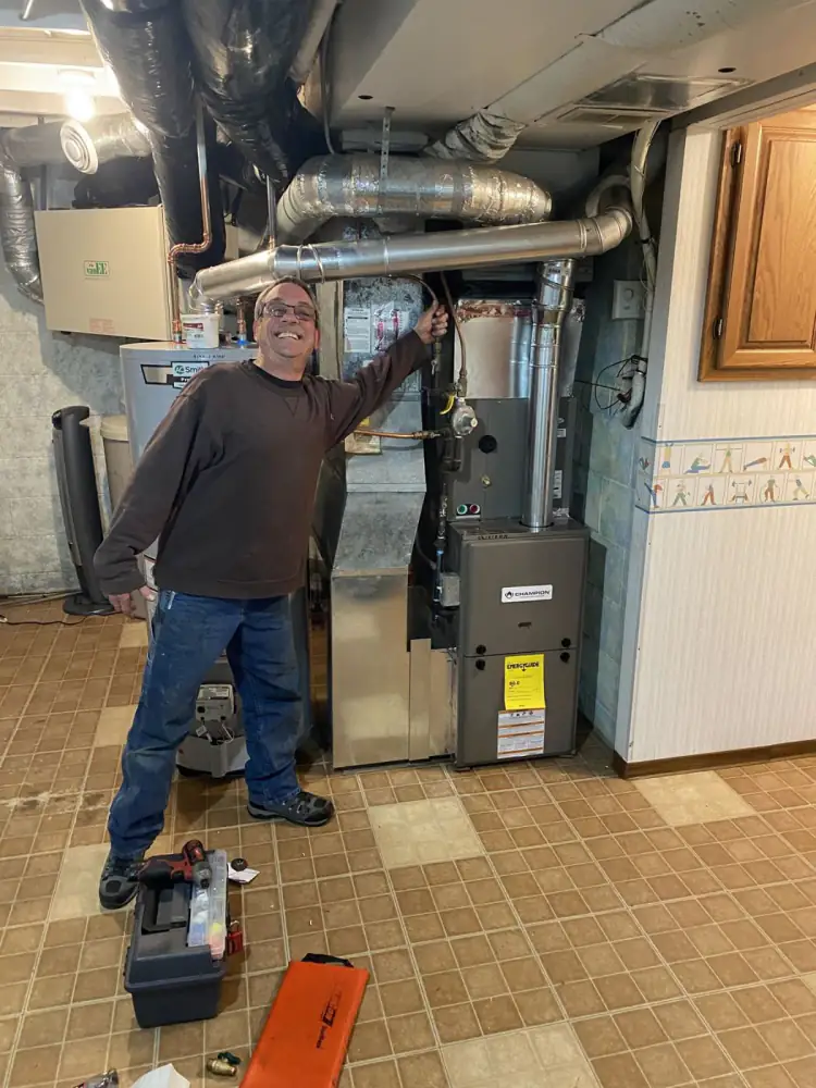 Nick finishing a furnace install